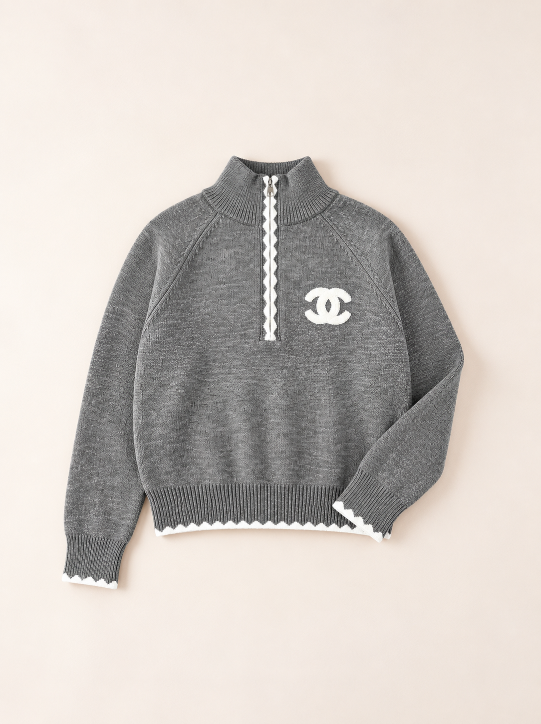 Pull zippé en maille CC