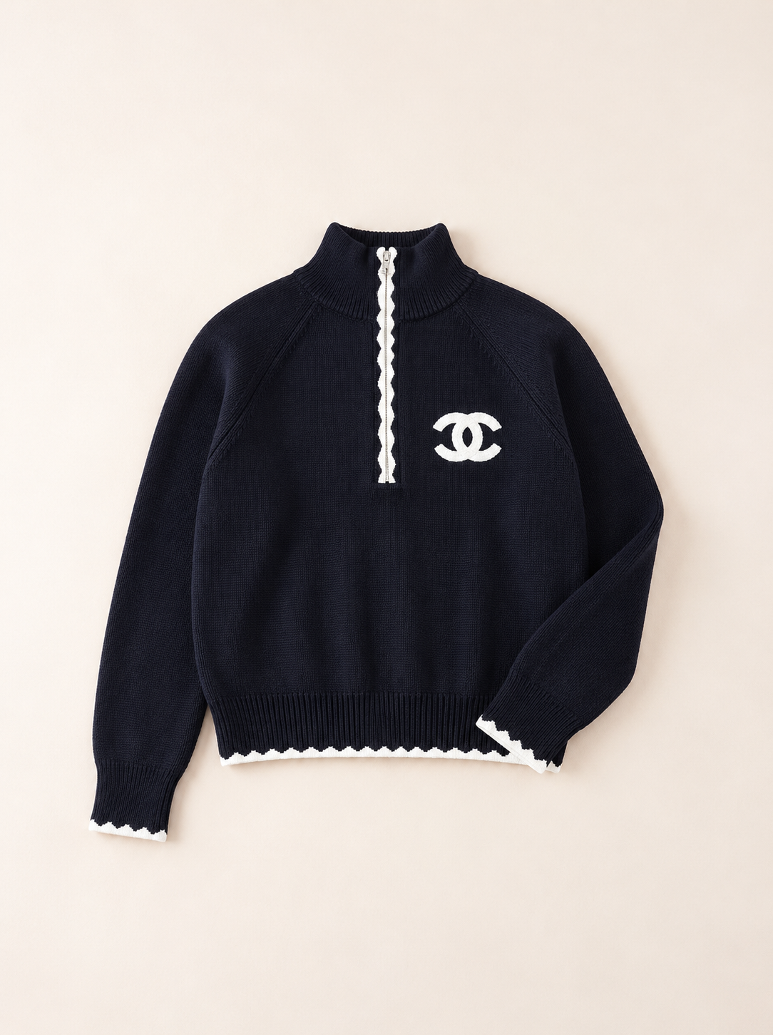 Pull zippé en maille CC